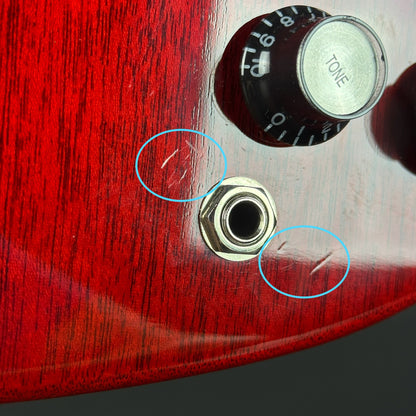 Scratches near output jack of Used Gibson '61 SG Reissue Cherry.