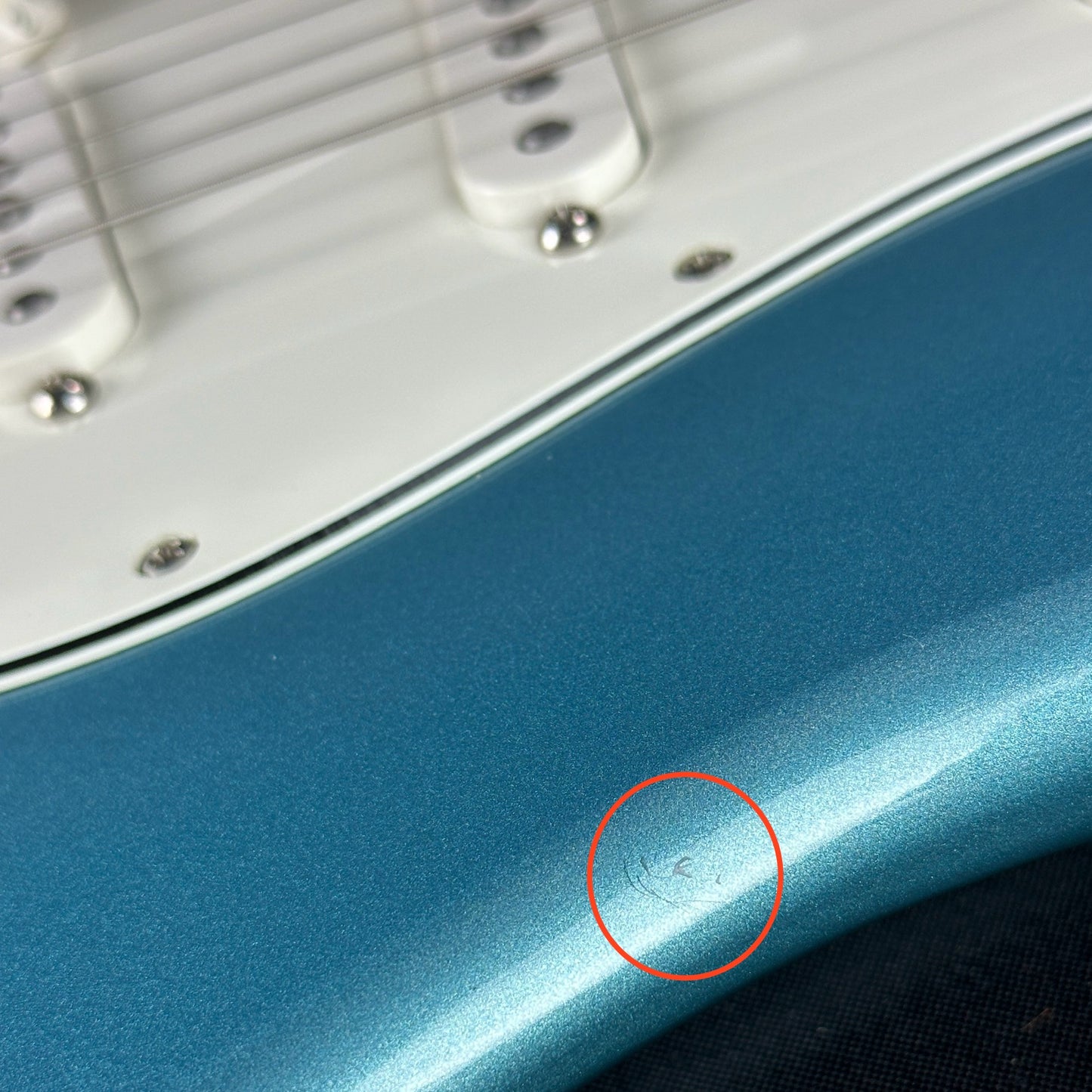 Ding on edge of Used Fender Player Strat Blue Left Handed.