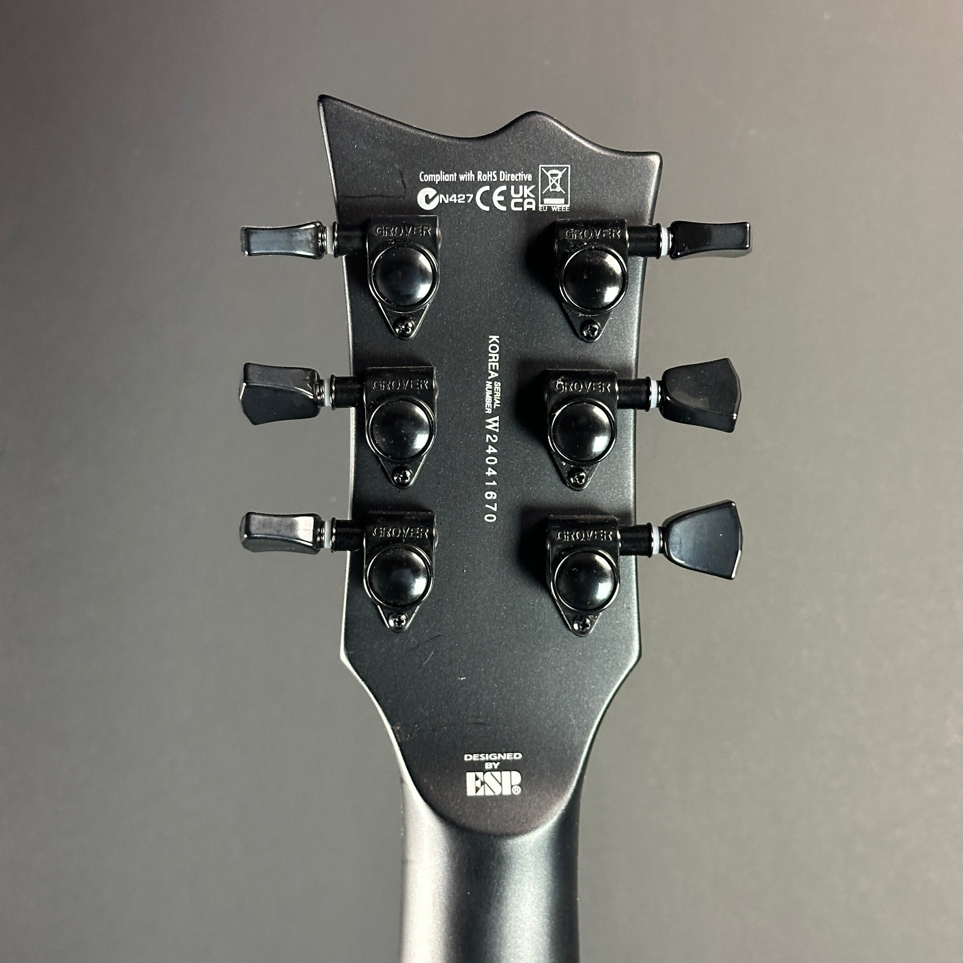 Back of headstock of Used ESP LTD Viper 1000 Deluxe Satin Black.