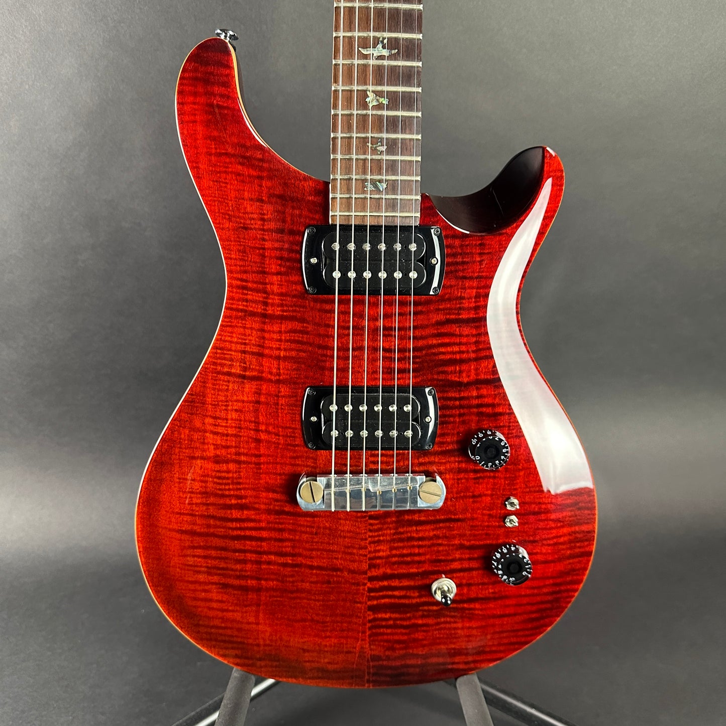 Front of body of Used PRS SE Paul's Guitar Red.