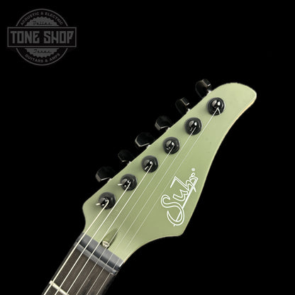 Front of headstock of Used Suhr Modern Terra HSH Forest Green.