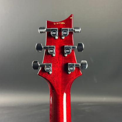 Back of headstock of Used 2006 PRS Custom 24 10 Top Ruby Red.