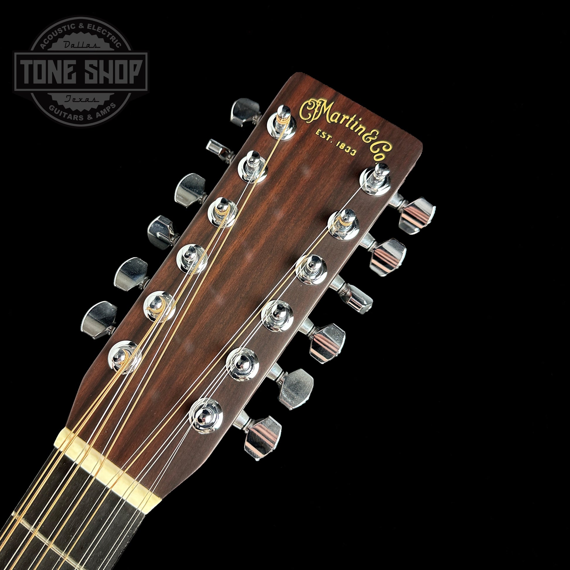 Front of headstock of Used Martin HD28-12.