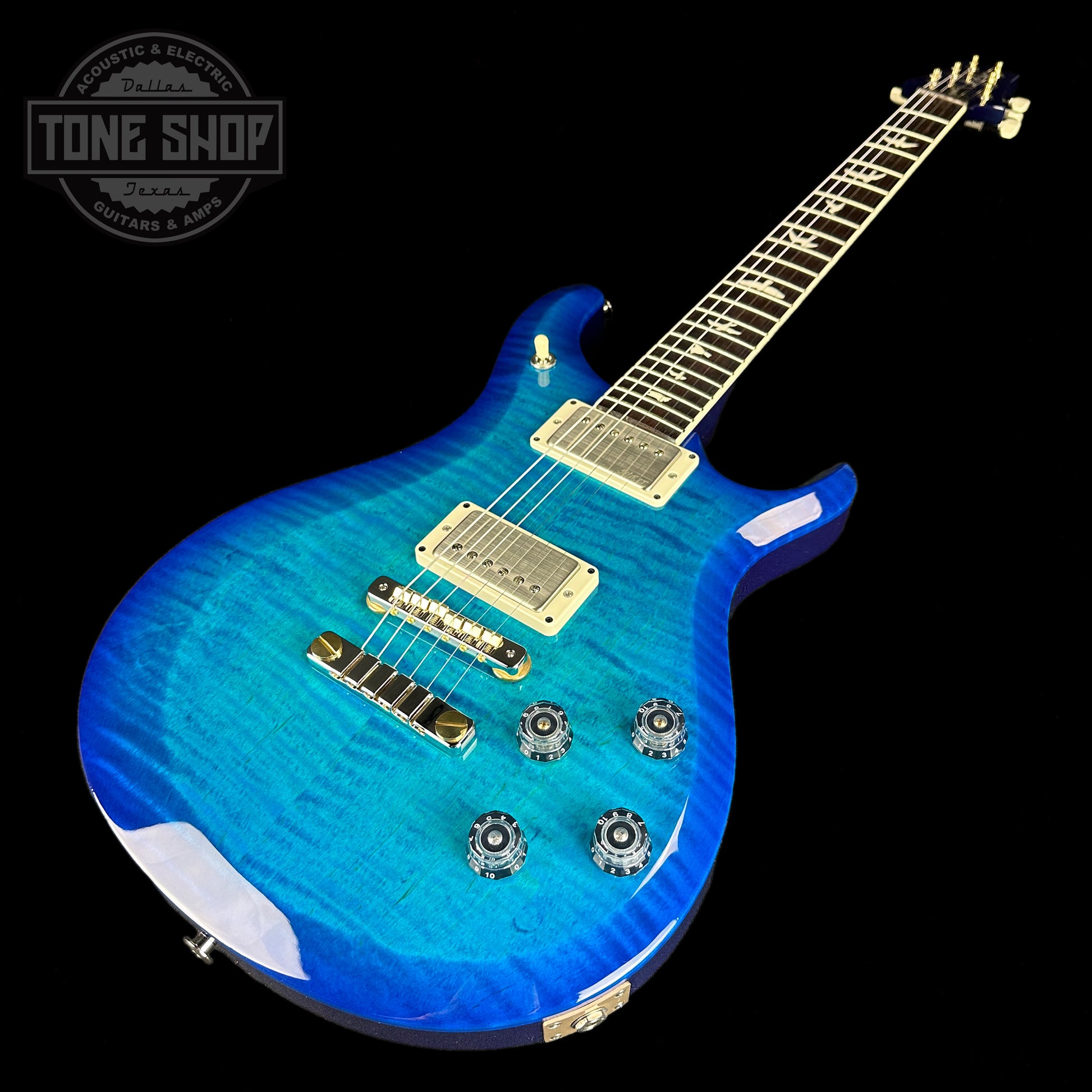 Front angle of PRS S2 McCarty 594 2024 Spec TSG Flame Top Lake Blue.