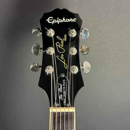 Front of headstock of Used Epiphone Les Paul 1960 Tribute Plus Burst.