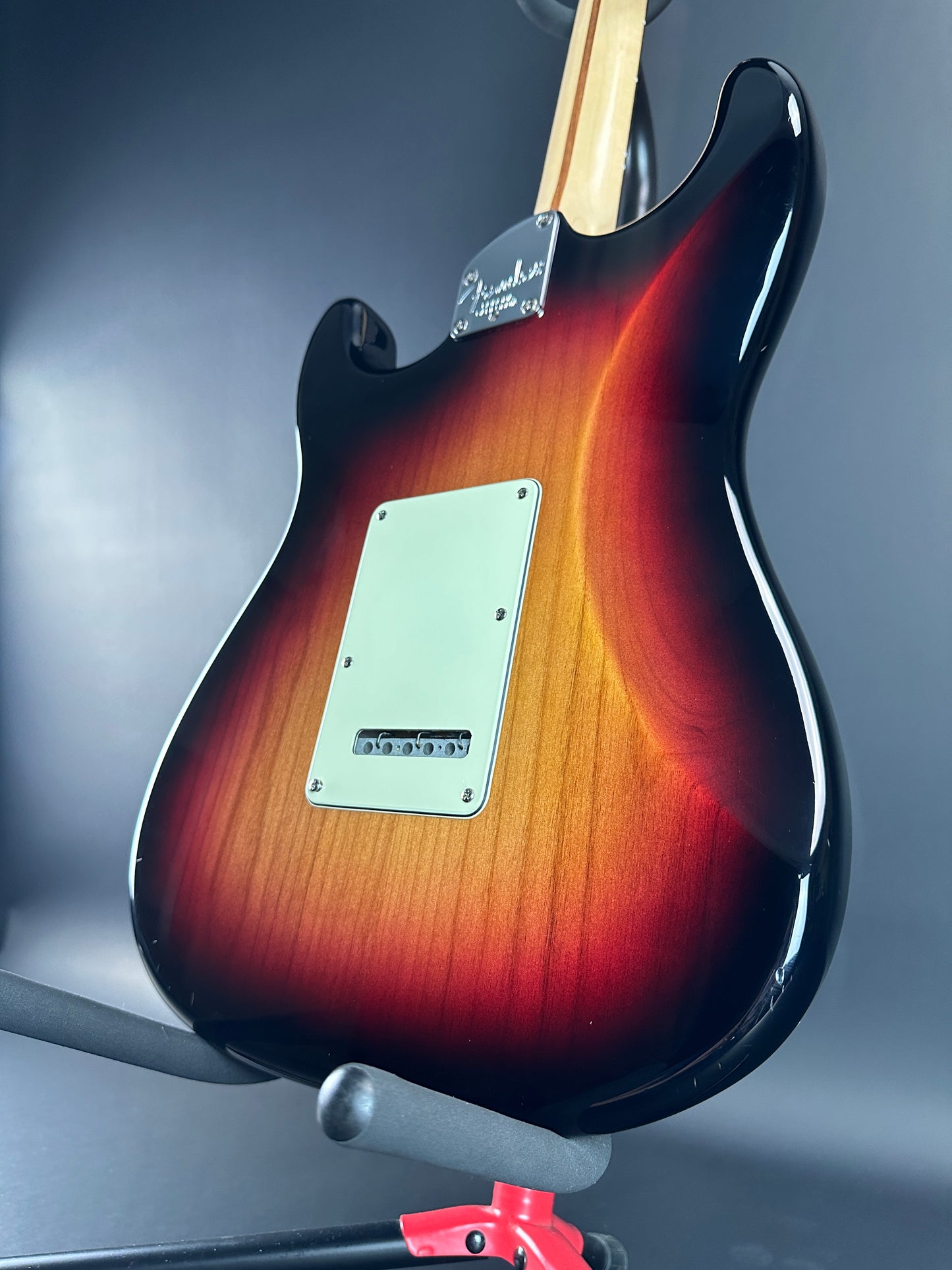 Back angle of Used Fender American Deluxe Strat Burst.