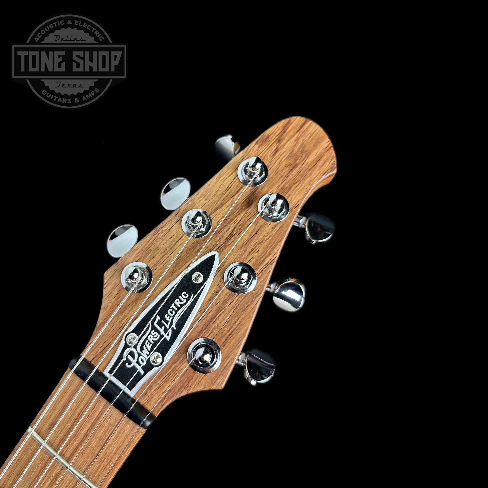 Front of headstock of Powers Electric A-Type Crayon Gray FF42 Pearl Ebony Neutral CamTail.