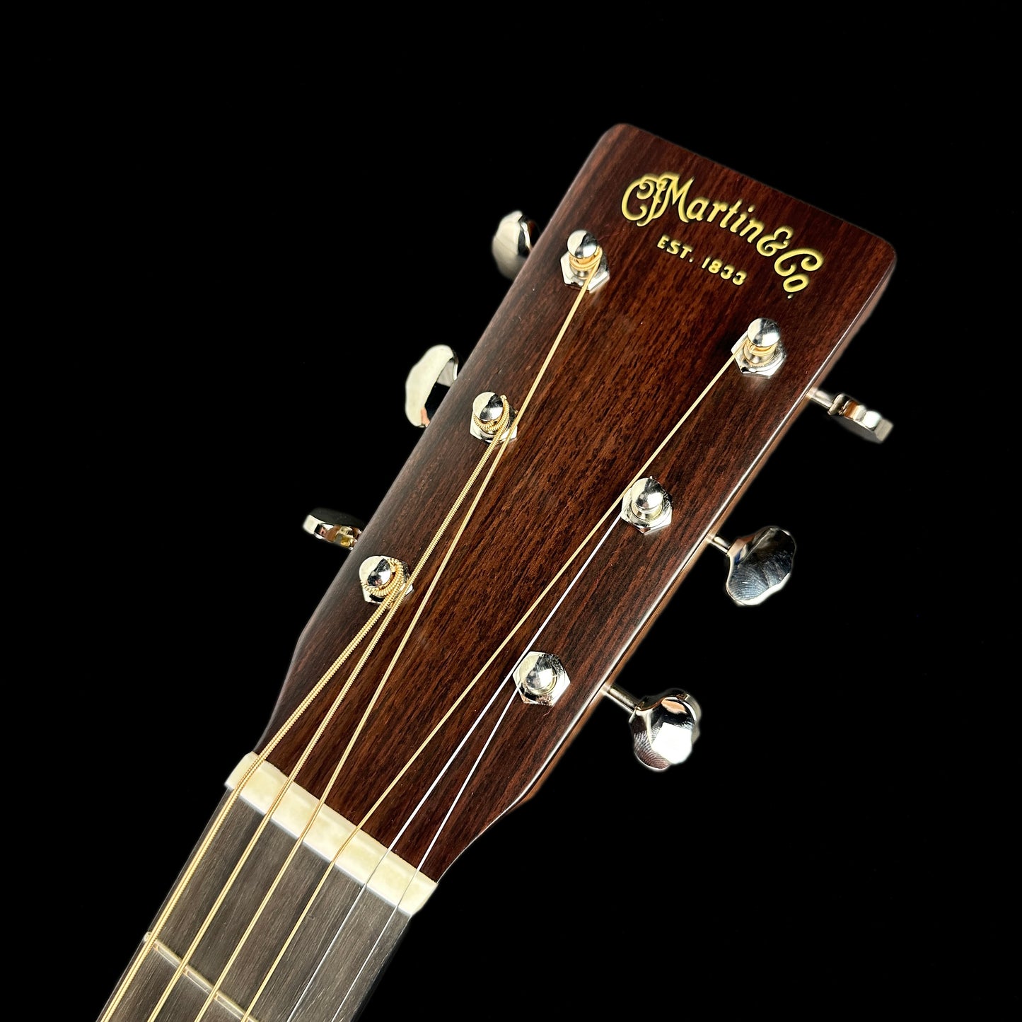 Front of headstock of Martin Custom Shop 18 Style Dread Adirondack/Mahogany.