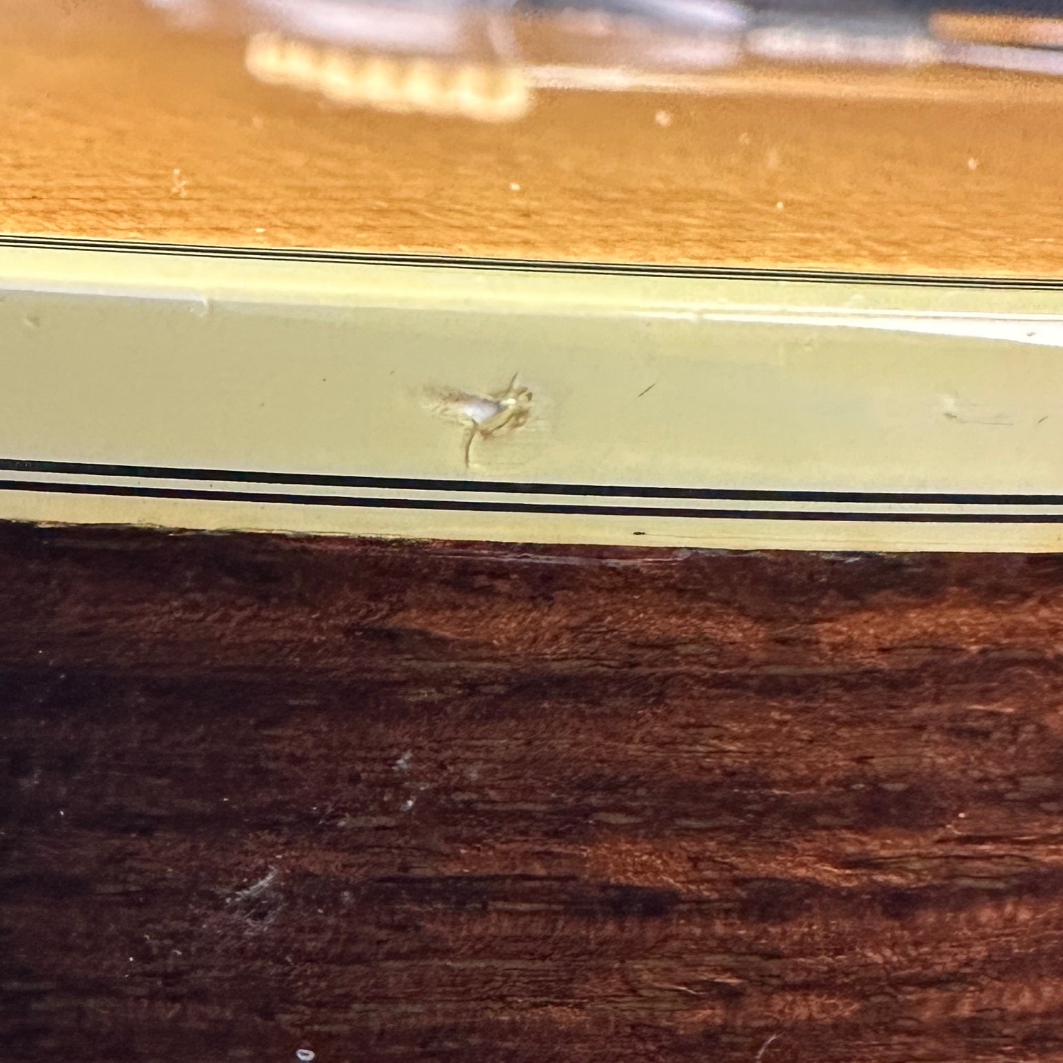 Small ding on edge of Used Guild D-35.