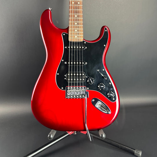 Front of Used Fender Standard Stratocaster HSS Candy Red Burst.