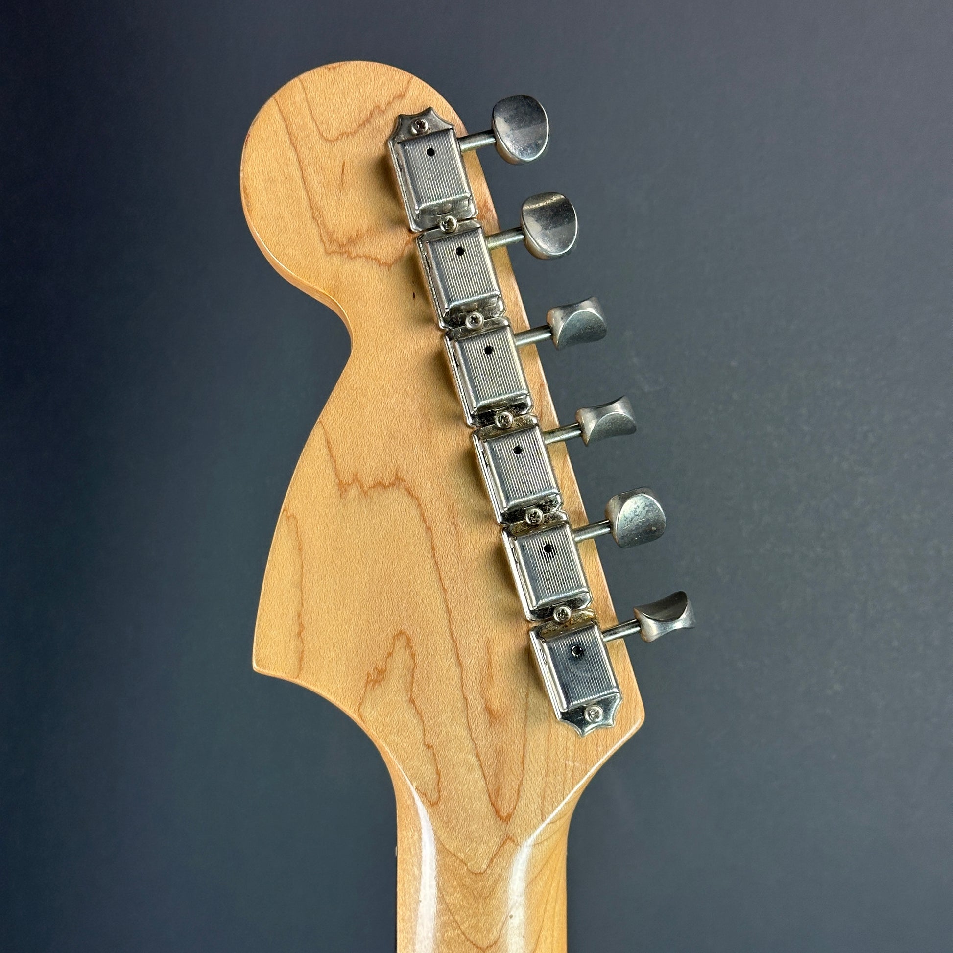 Back of headstock of Used 1999 Squier Vista Musicmaster Black.