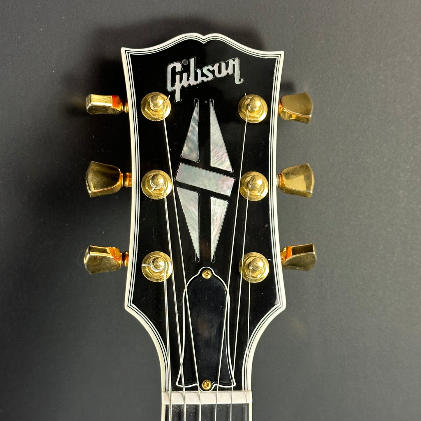 Front of headstock of Used 2005 Gibson ES-137.