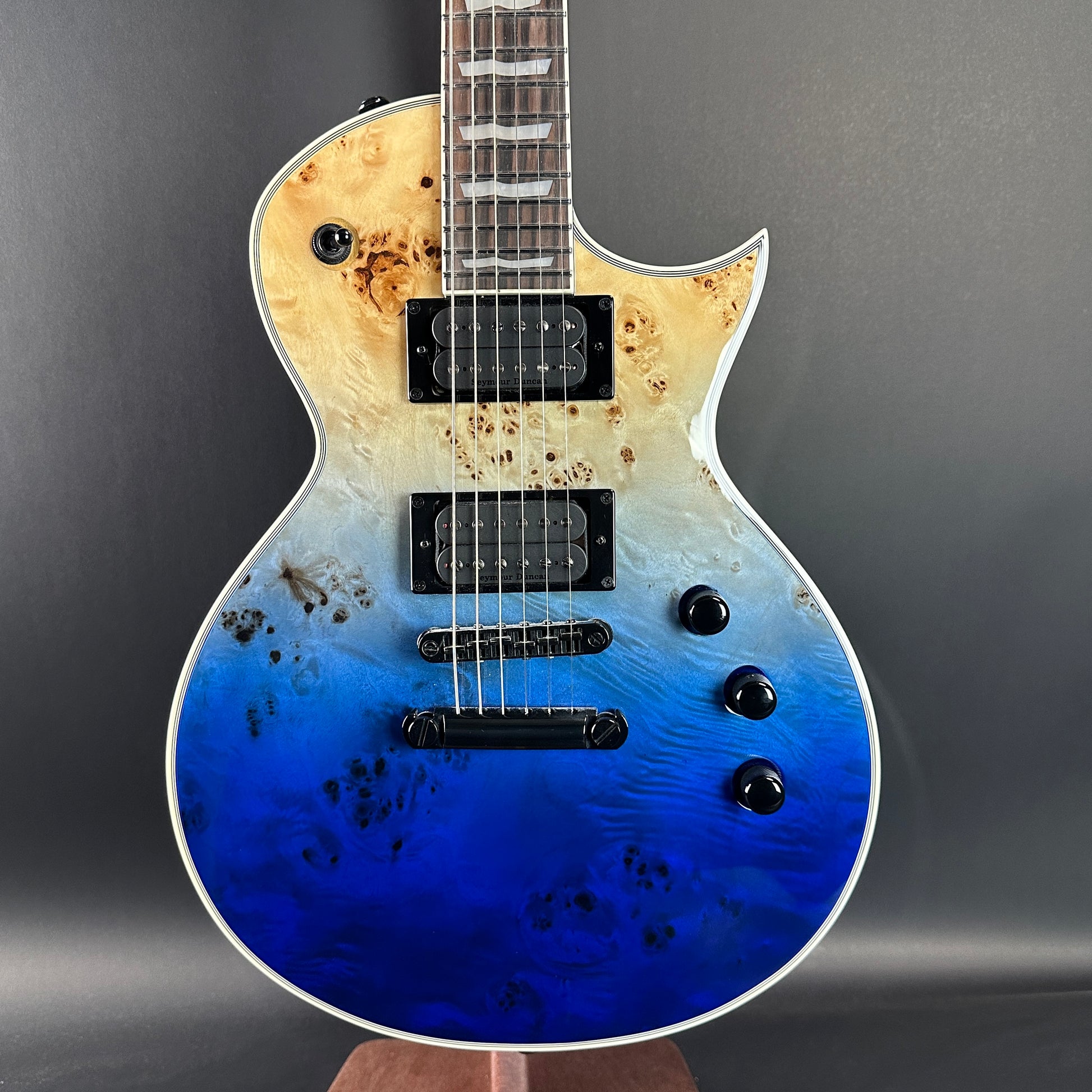 Front of Used ESP LTD EC-1000 Deluxe Blue Nat Fade.