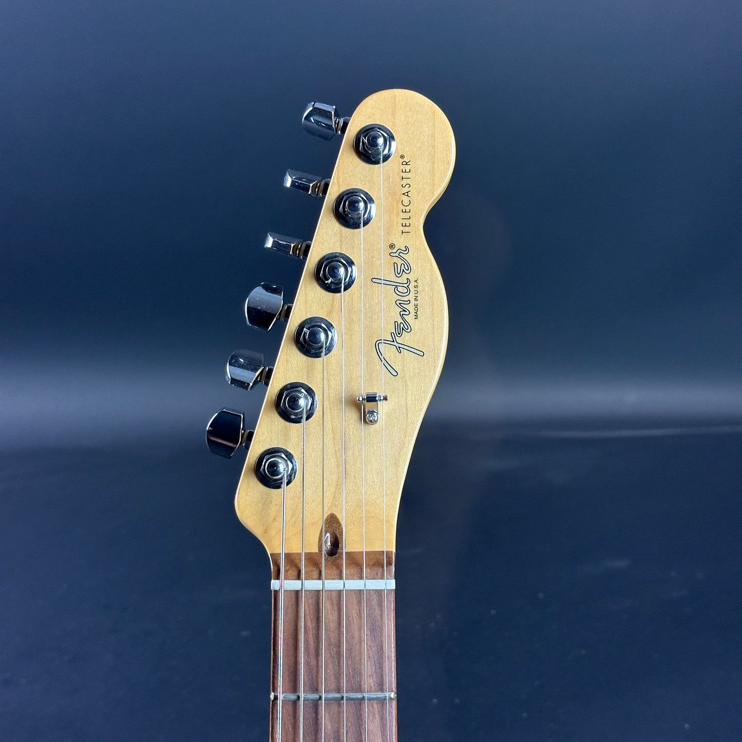 Front of headstock of Used Fender American Standard Tele RW Natural.