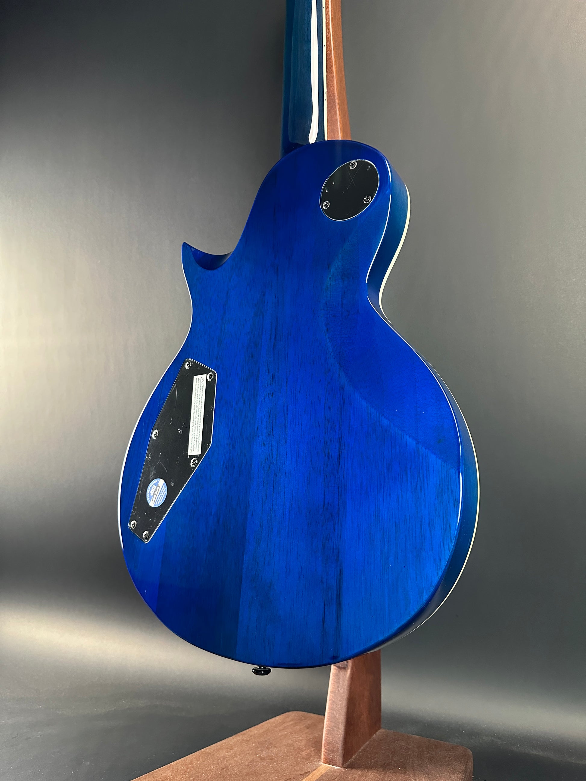 Back angle of Used ESP LTD EC-1000 Deluxe Blue Nat Fade.