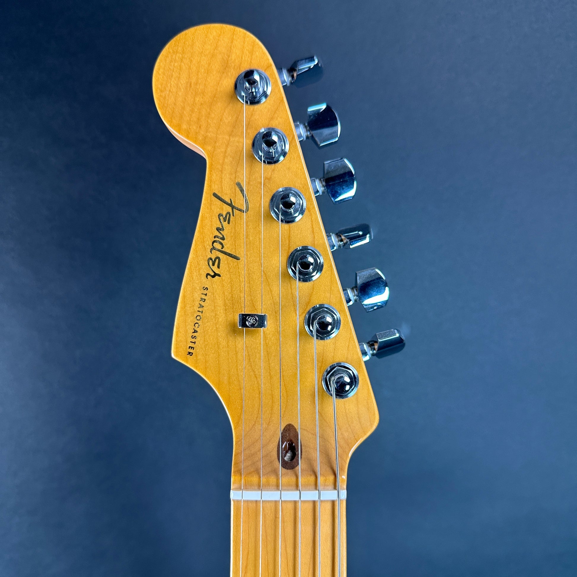 Front of headstock of Used Fender American Ultra Stratocaster Left Hand Ultraburst.