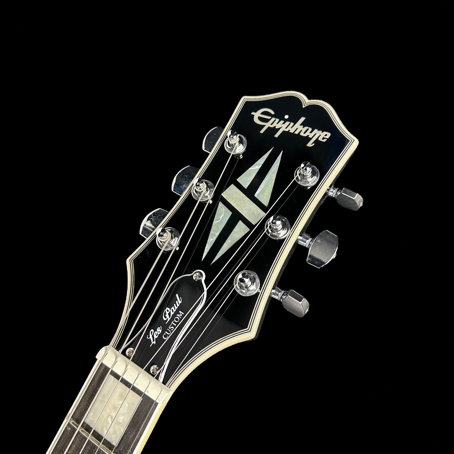 Front of headstock of Used Epiphone Adam Jones The Berserker Les Paul.