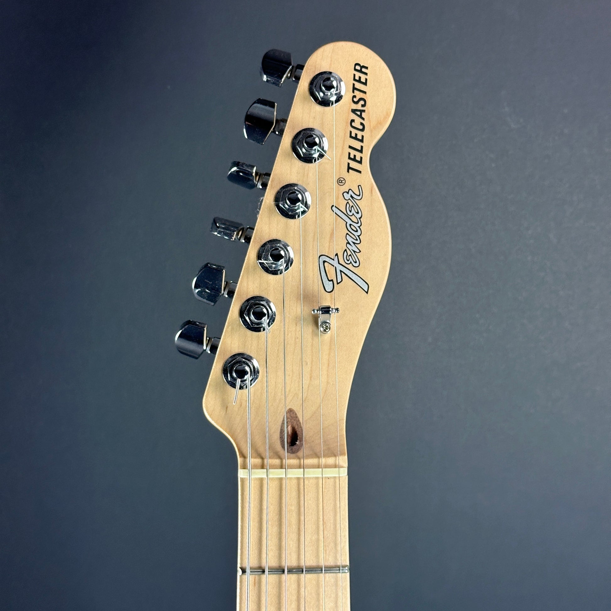 Front of headstock of Used Fender American Performer Telecaster 3-Color Sunburst.