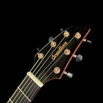 Front of headstock of Used Breedlove Pursuit EX Eco S Concert Myrtlewood Sunsetburst.