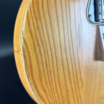 Wear on side edge of Used 1978 Peavey T-60 Natural.