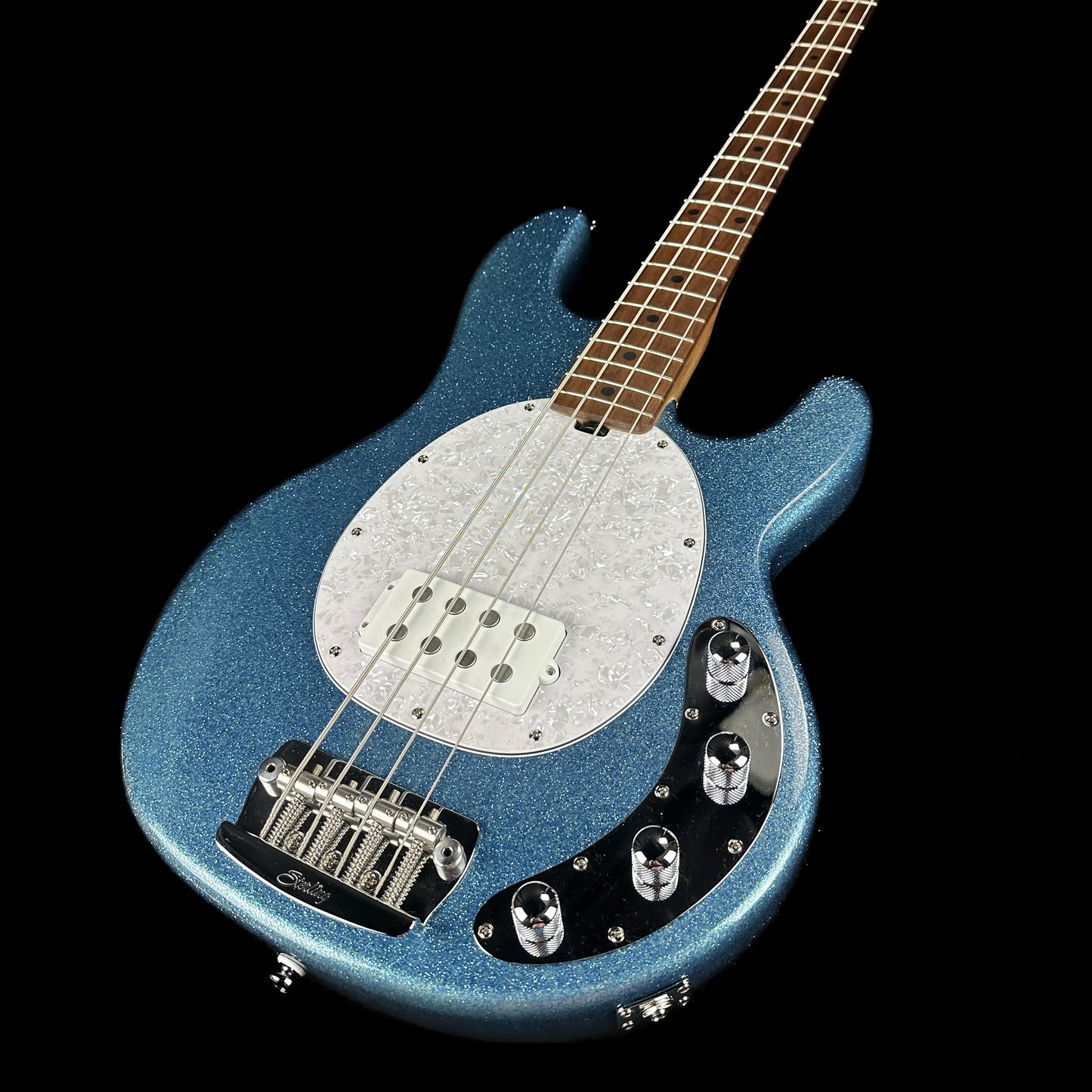 Front angle of Used Sterling Ray 34 Bass Blue Sparkle.