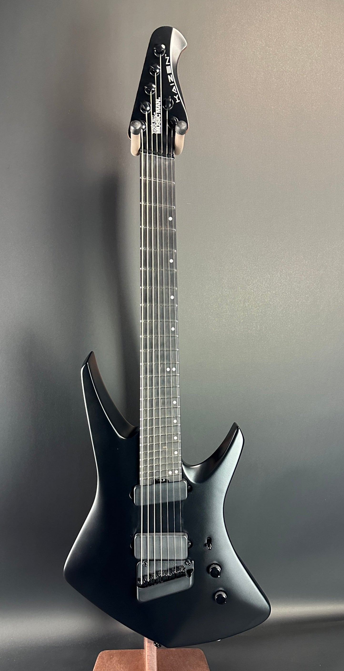 Full front of Used Ernie Ball Music Man Kaizen 7 Apollo Black.