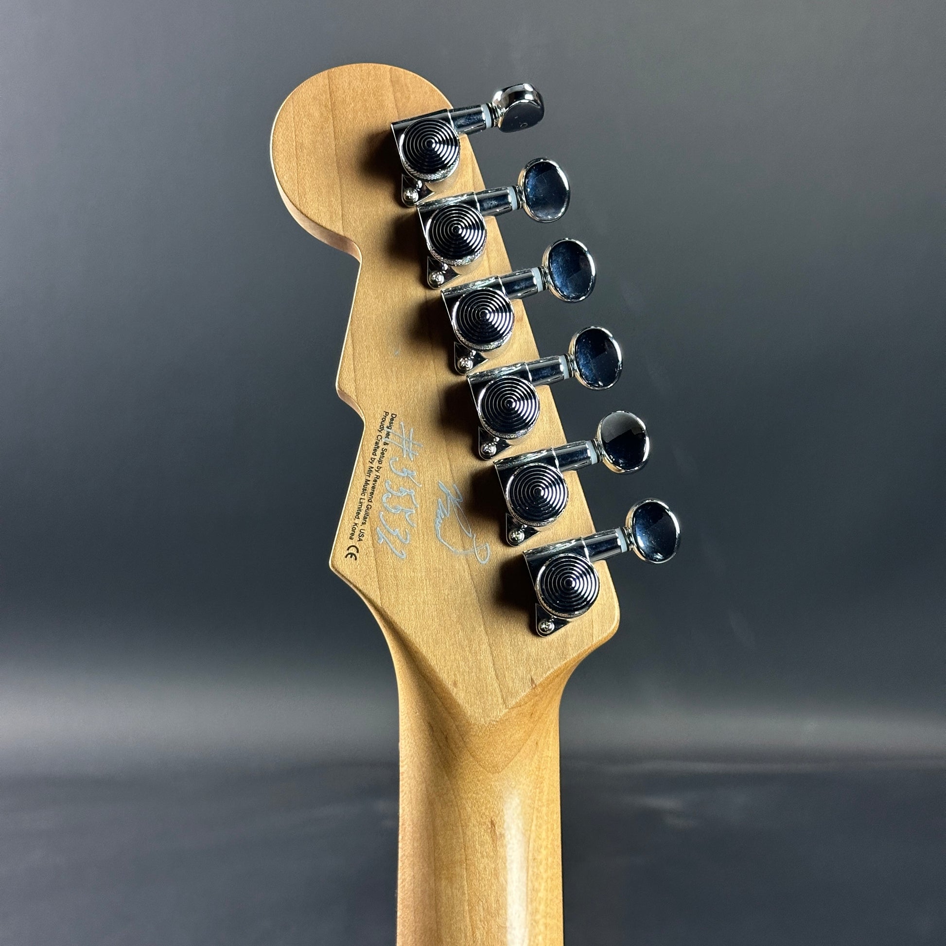 Back of headstock of Used Reverend Double Agent OG Periwinkle Burst.