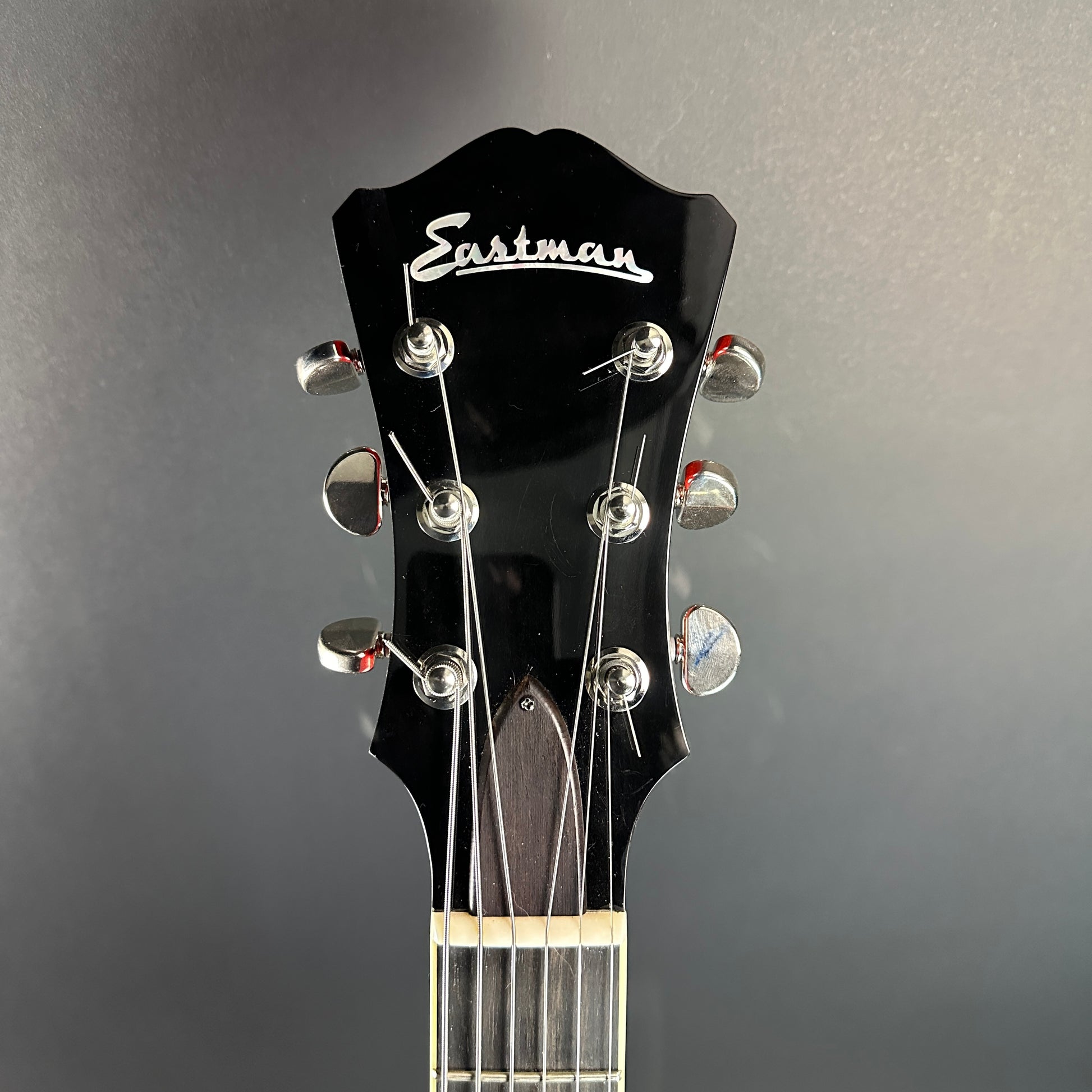 Front of headstock of Used Eastman AR50CE.