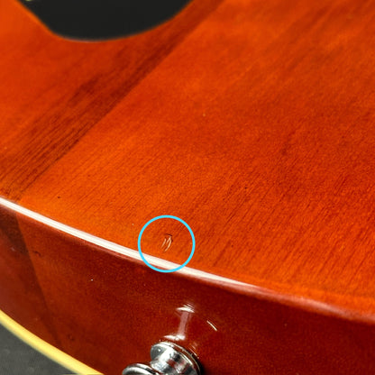 Ding on bottom edge of Used Harley Benton 550 Deluxe Dark Burst.