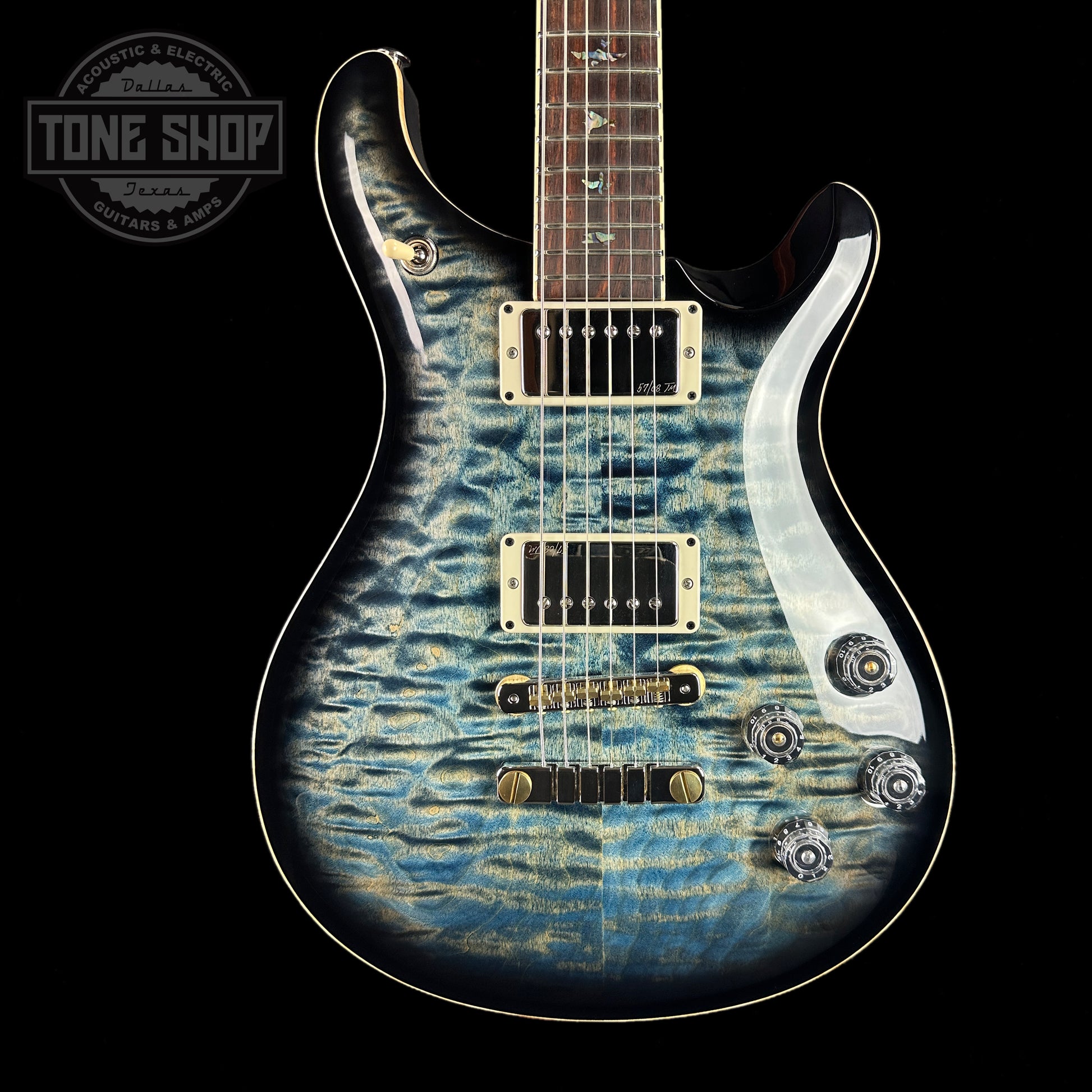 Front of PRS Wood Library McCarty 594 10-top Quilt Faded Whale Blue Smokeburst.