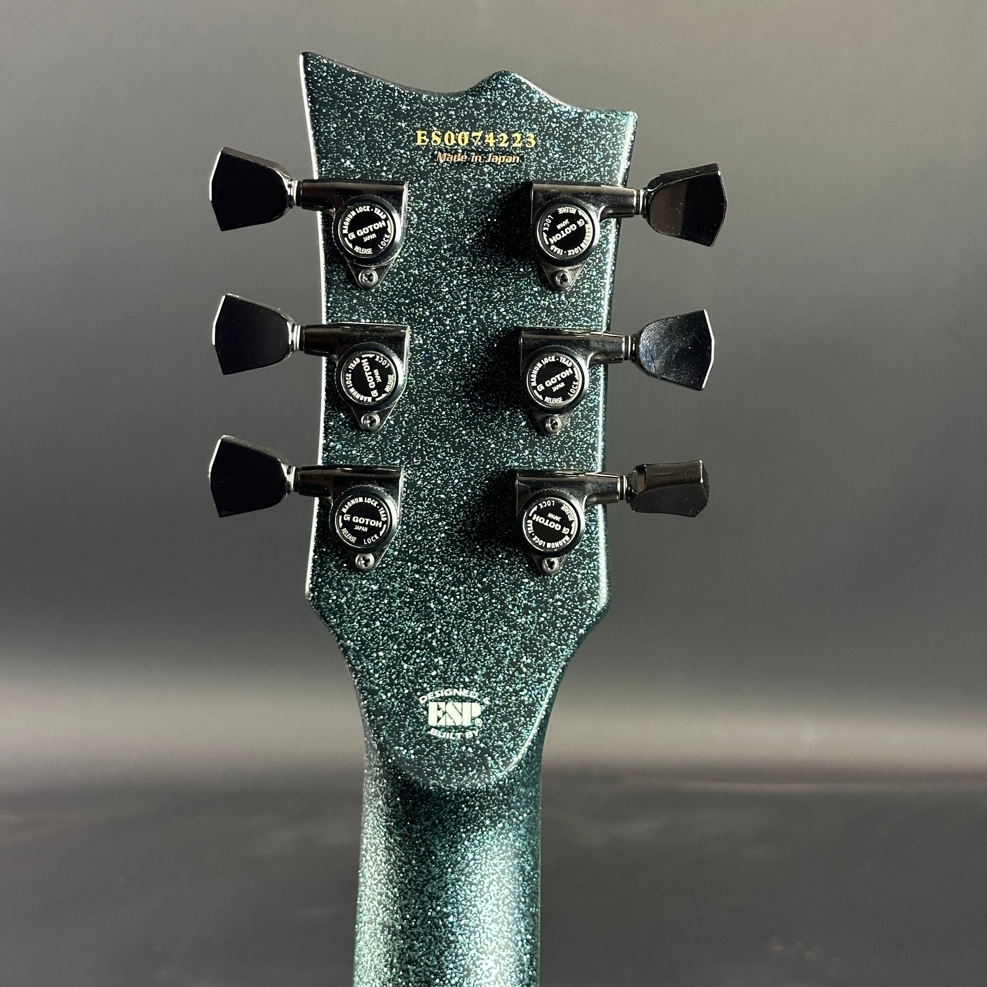 Back of headstock of Used ESP E-II Eclipse Granite Sparkle.