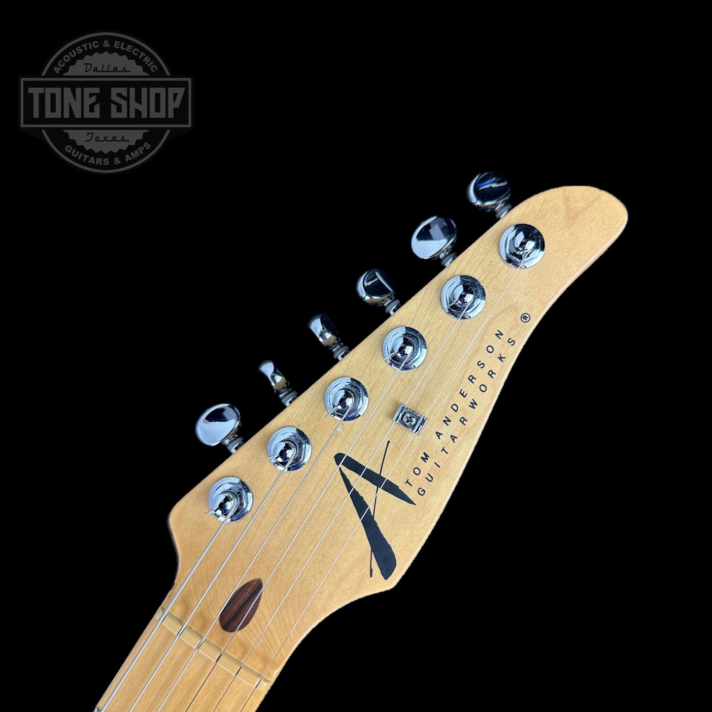 Front of headstock of Used 1996 Tom Anderson Classic S Black.