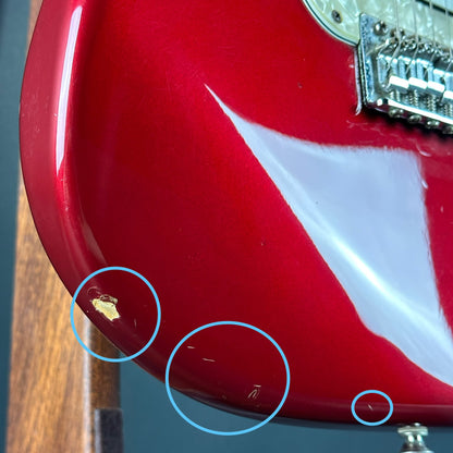 Dings on bottom edge of Used 2006 Fender Sam Ash 48th Street Red Strat.