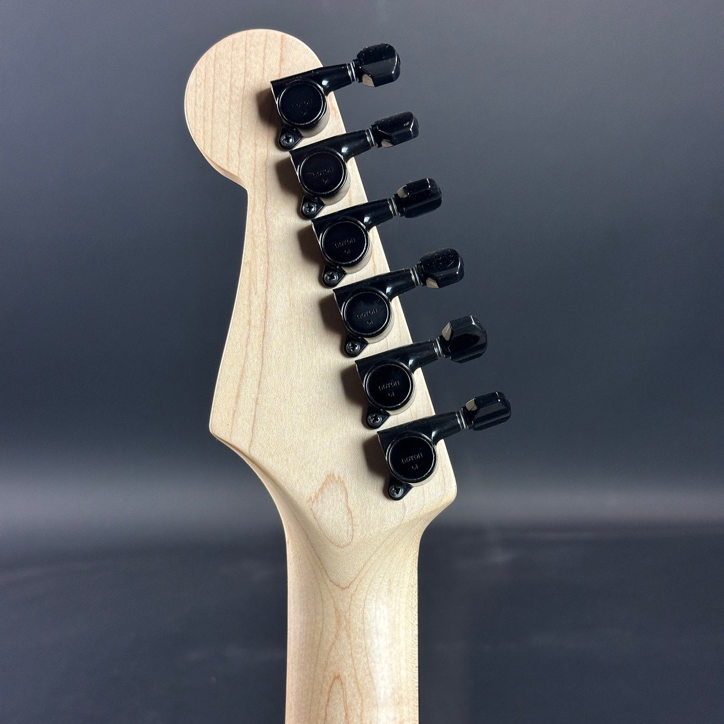 Back of headstock of Used Fender Limited Edition HM Strat Bright White.