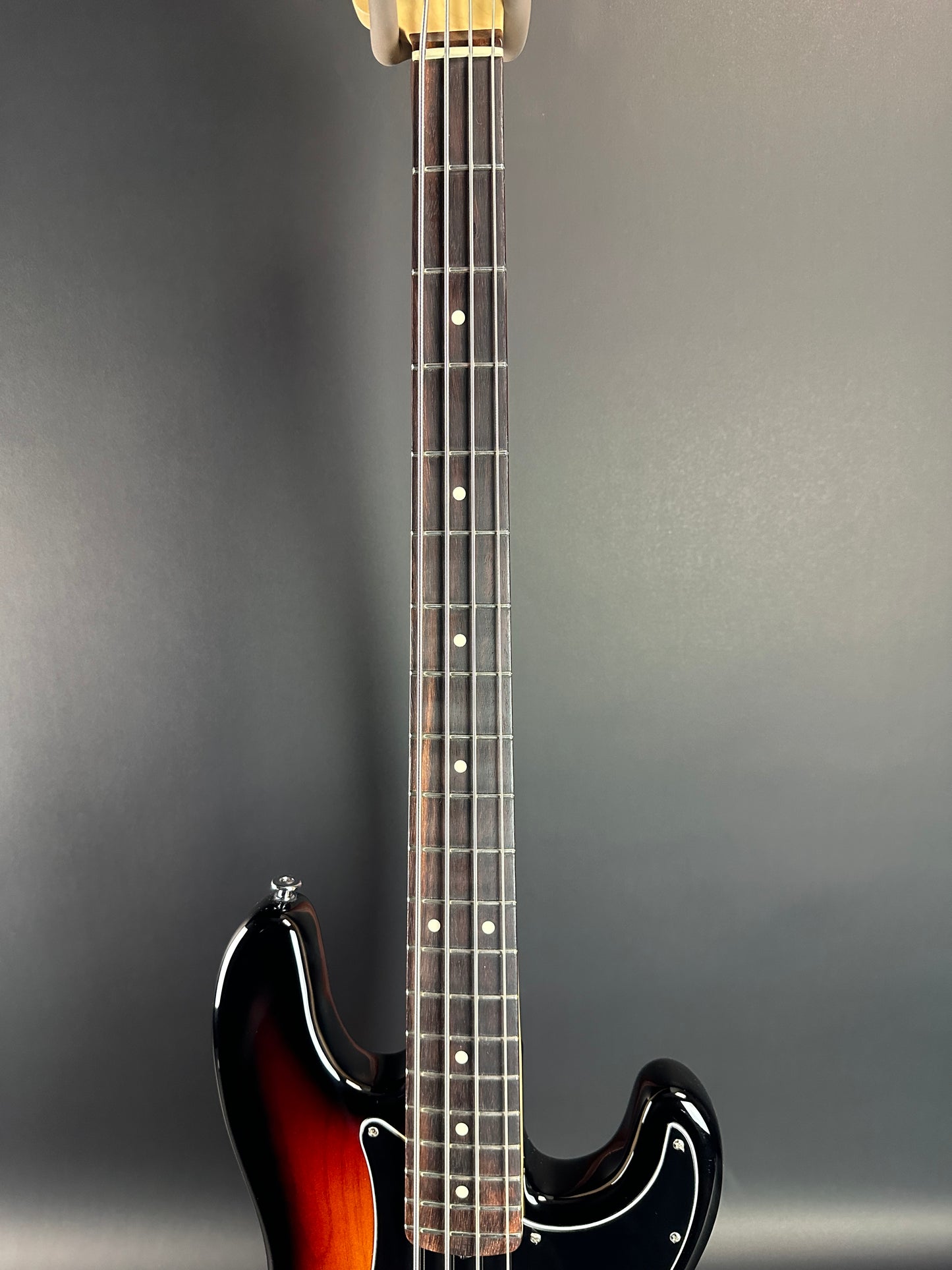 Fretboard of Used 2013 Fender American Performer P Bass Sunburst.