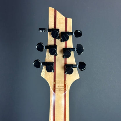 Back of headstock of Used Schecter C-1 Apocalypse Carbon Black.