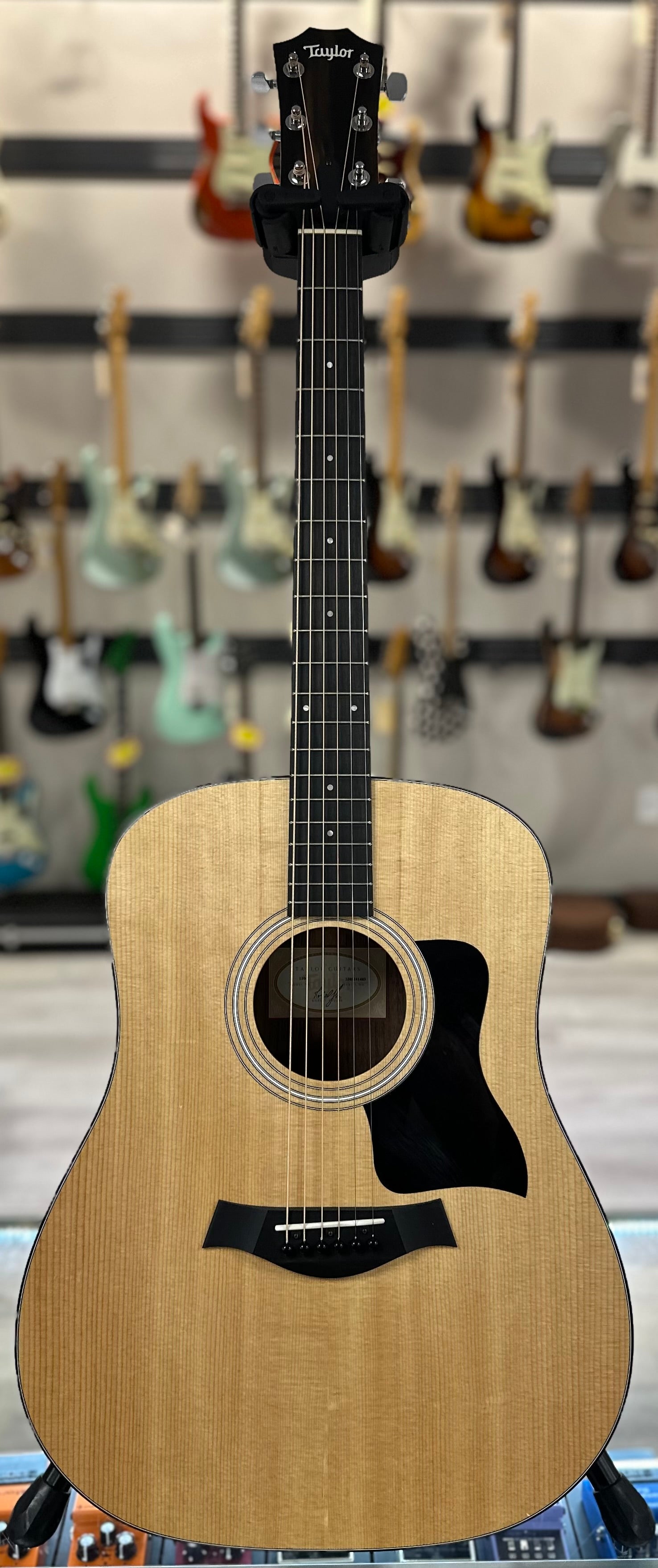 Full front of Used 2021 Taylor 110E Natural w/bag TSS4186
