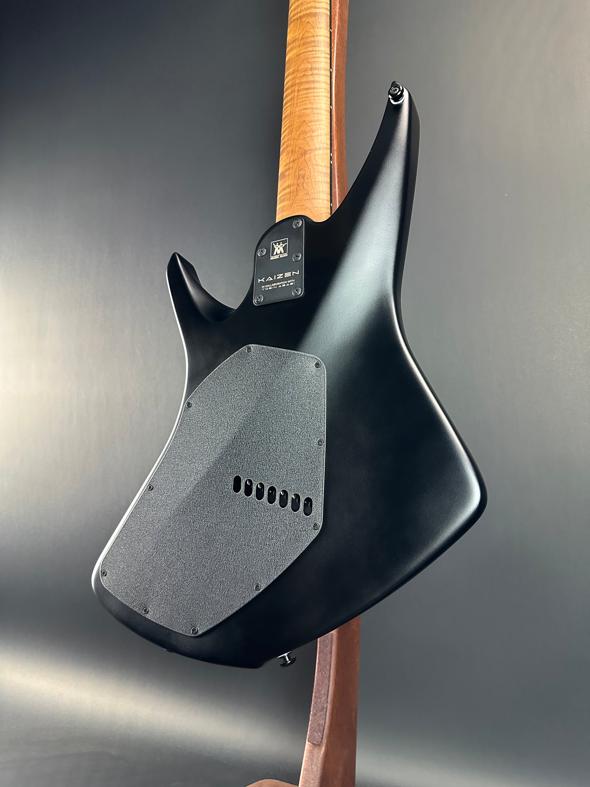 Back angle of Used Ernie Ball Music Man Kaizen 7 Apollo Black.