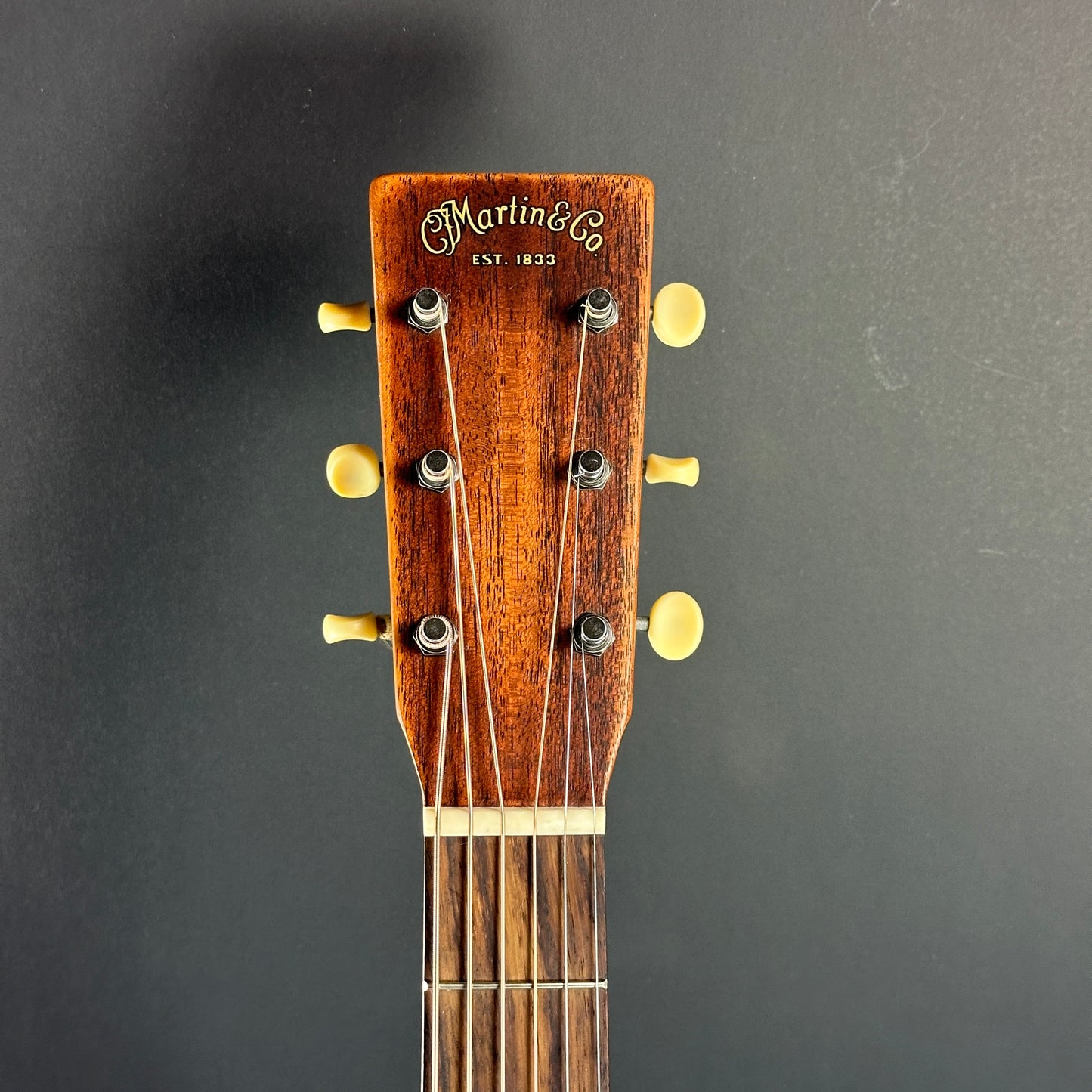 Front of headstock of Used Martin 000-15M Street Master.