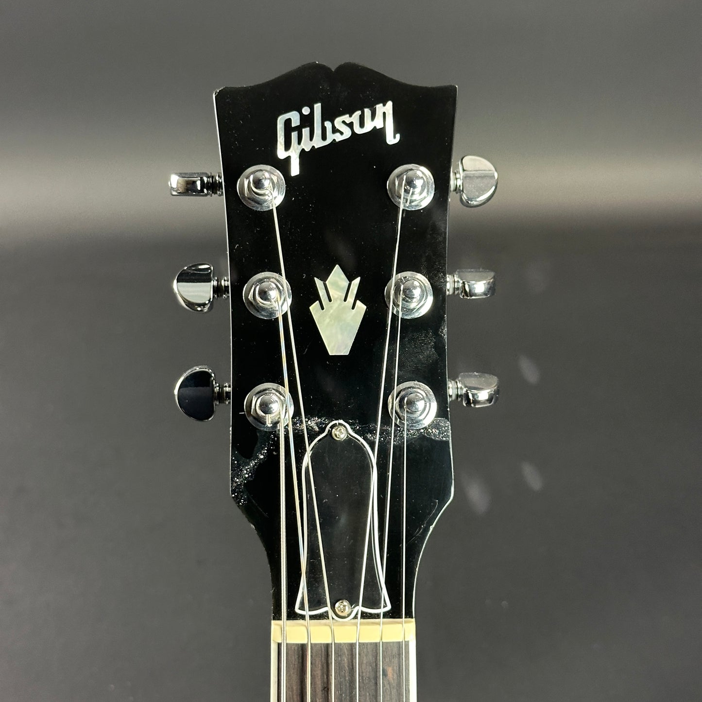 Front of headstock of Used Gibson SG Modern Trans Ebony Fade.