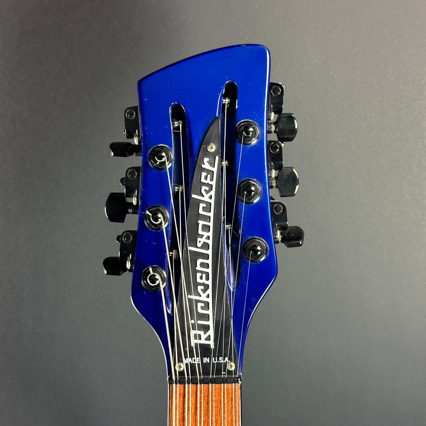 Front of headstock of Used 1988 Rickenbacker 620 Midnight Blue.