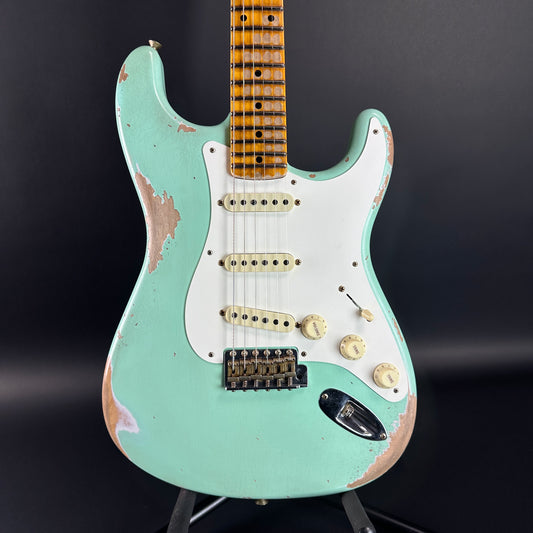 Front of Fender Custom Shop Time Machine '57 Strat Heavy Relic Aged Surf Green.