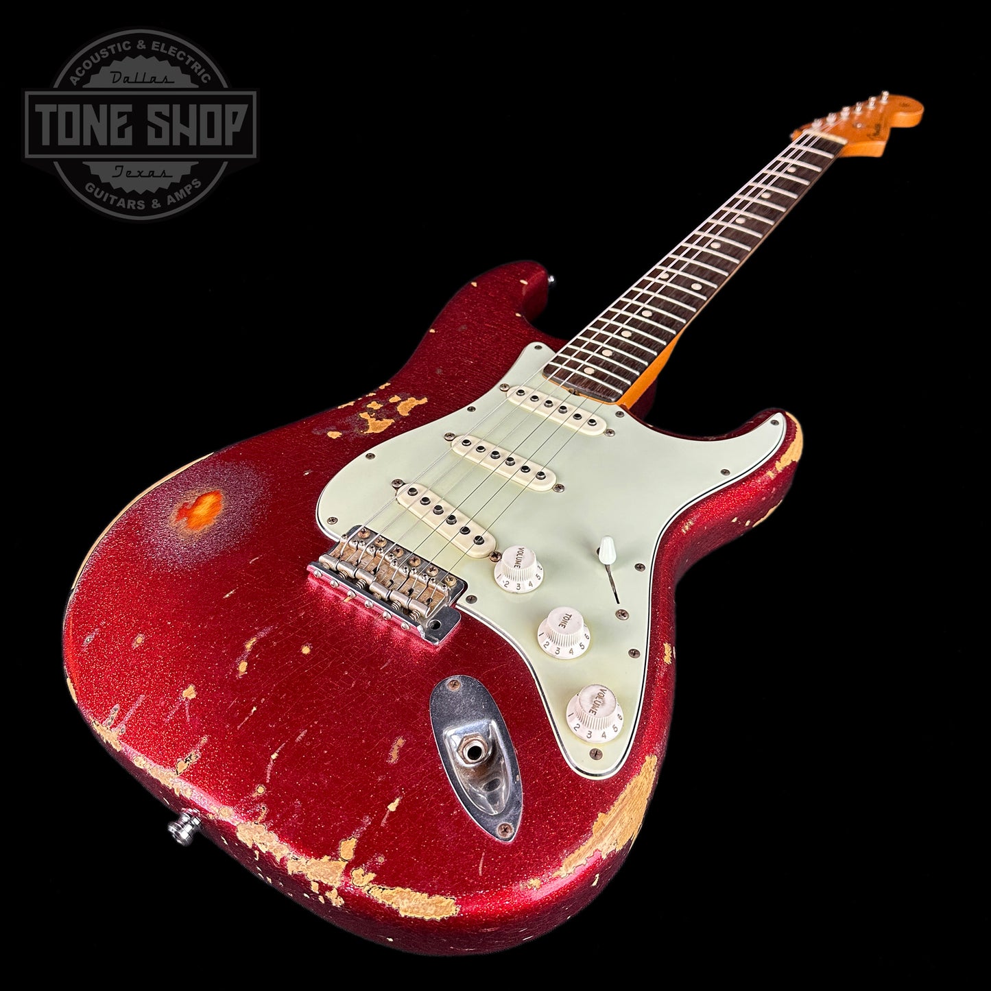 Front angle of Used Fender Custom Shop Jason Smith Masterbuilt Strat 60s Relic Red Sparkle.