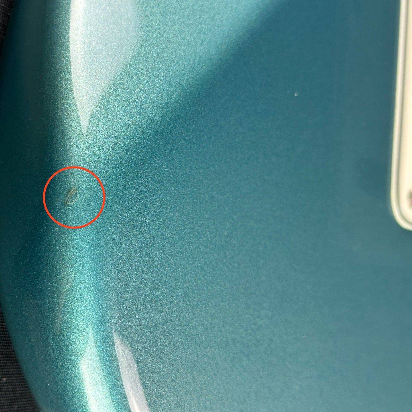 Ding on bottom edge of Used Fender Player Strat Blue Left Handed.