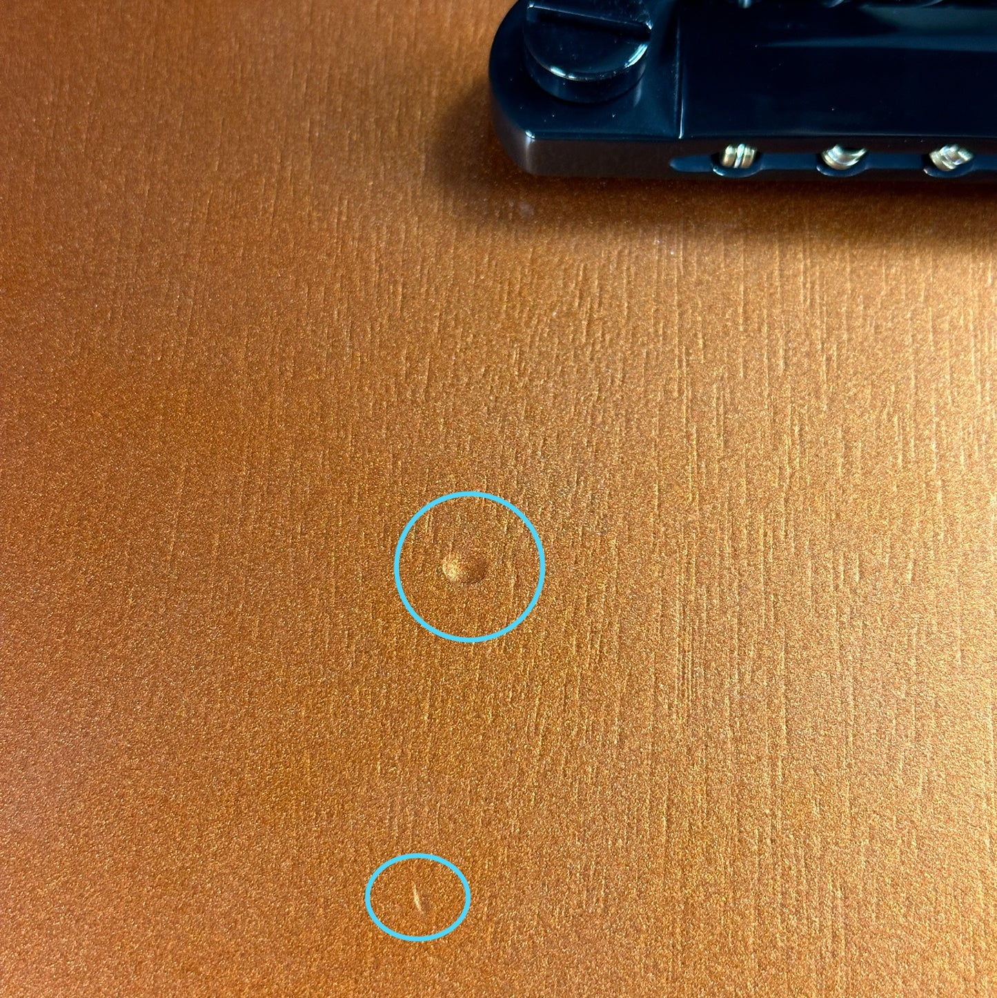 Two small dings near bridge of Used Gibson Non-Reverse Firebird Limited Edition Vintage Copper.