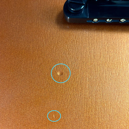 Two small dings near bridge of Used Gibson Non-Reverse Firebird Limited Edition Vintage Copper.