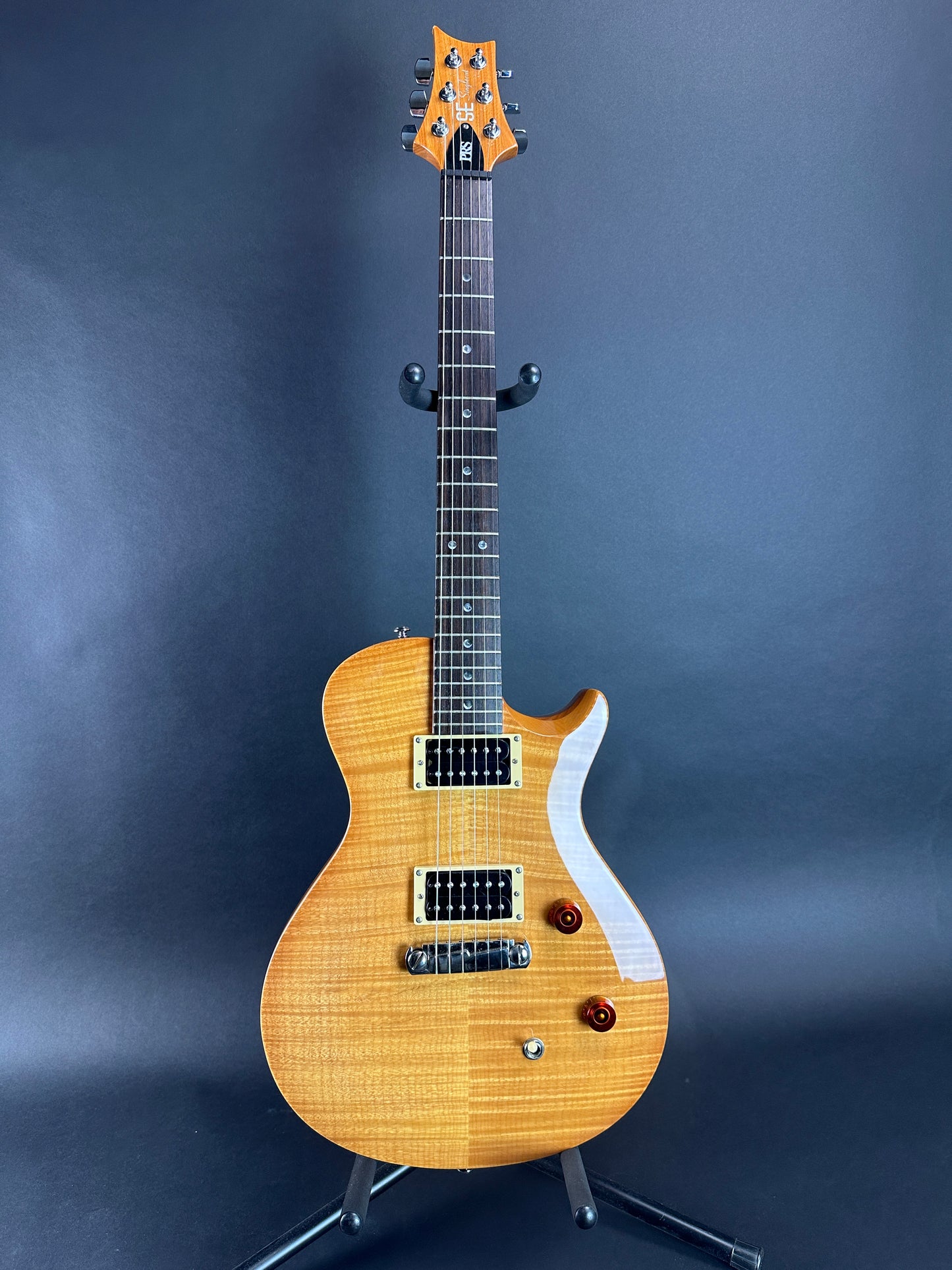 Full front of Used PRS SE Singlecut Natural.