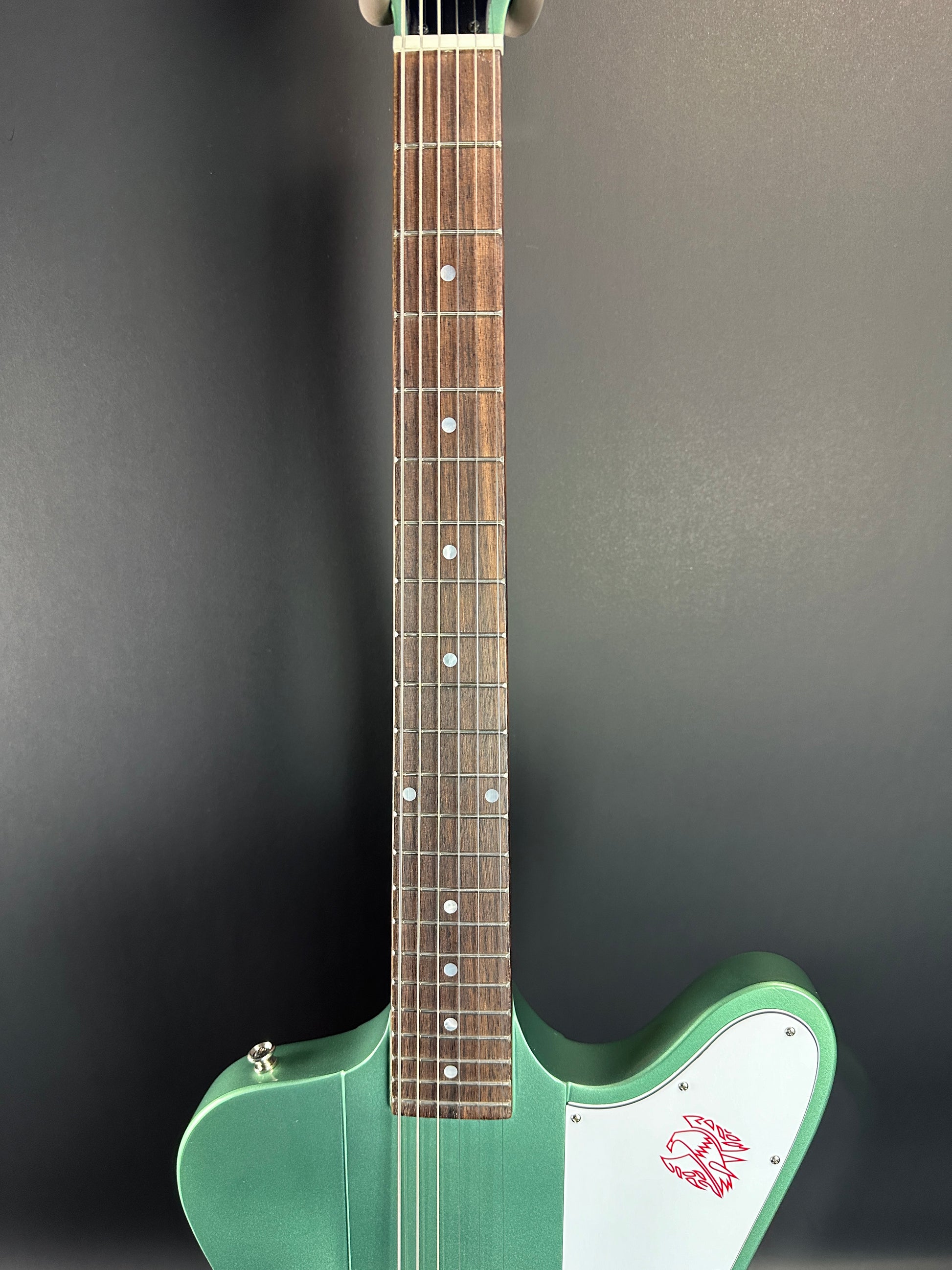 Fretboard of Used Epiphone Inspired by Gibson Custom 1963 Firebird Inverness Green.