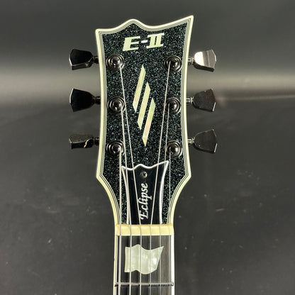 Front of headstock of Used ESP E-II Eclipse Granite Sparkle.