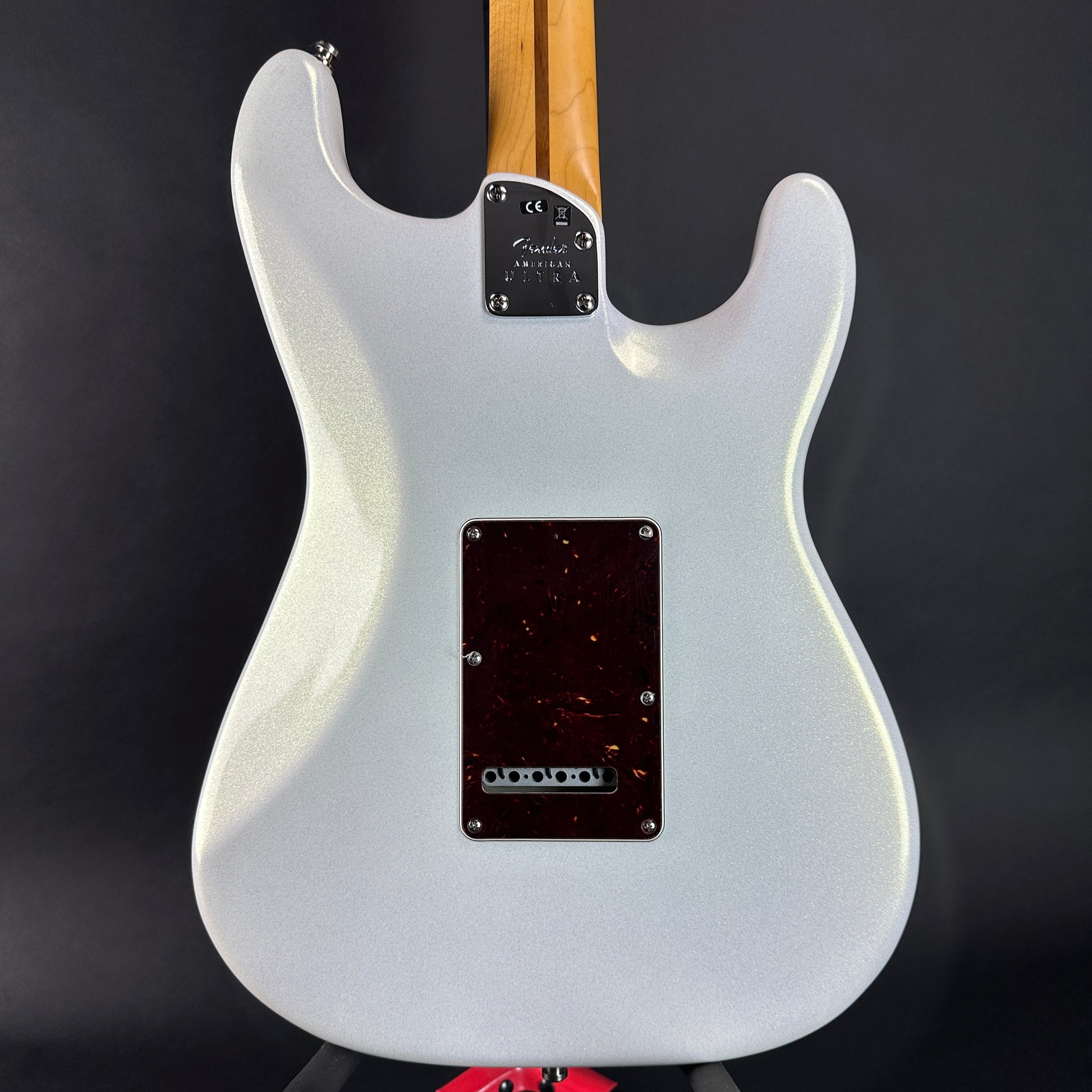 Back of Used Fender American Ultra Stratocaster Left Hand Arctic Pearl.